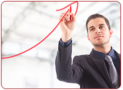 young man analyzing rates on a white board